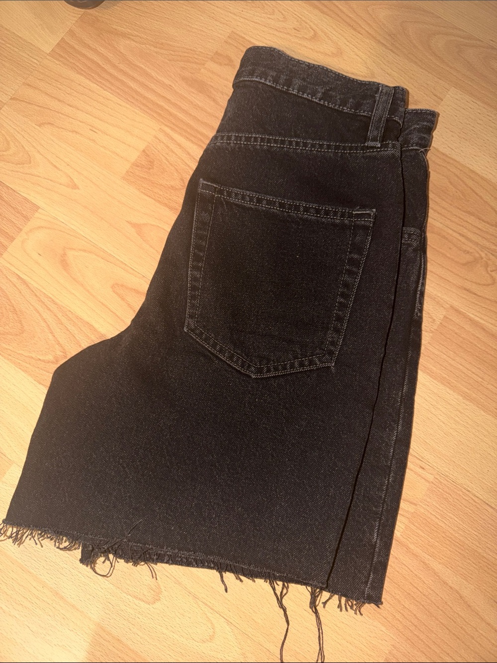 Black Denim Mini Skirt with Raw Hem